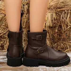 Stylish brown platform ankle boots featuring decorative buckles and side zippers for women