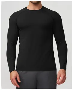 Close-up of black seamless athletic long-sleeve shirt with breathable mesh texture