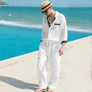 Full-body view of men's white linen leisure set featuring long-sleeve shirt and pants