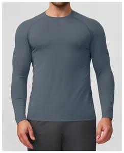 Men's grey blue seamless long-sleeved athletic t-shirt with breathable mesh texture.