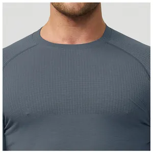 Detail view of seamless grey men's sports t-shirt with breathable textured fabric