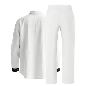 Back view of white linen men's leisure set featuring long sleeves and trousers