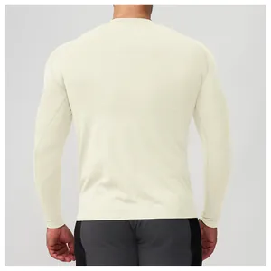 Back view of men's seamless long sleeve athletic shirt in cream color for gym and running