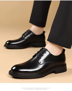 Close-up of classic black leather Derby shoes with a formal lace-up design.
