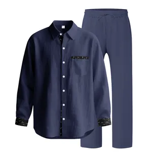 Detailed view of men's blue linen two-piece set featuring long-sleeve shirt and trousers