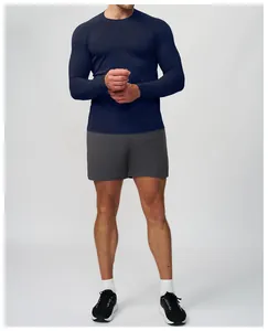 Detailed view of a men's navy blue seamless athletic long-sleeve t-shirt for fitness