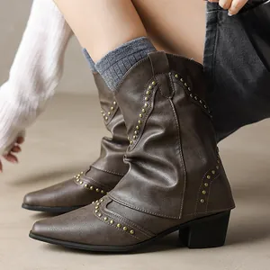 Retro Western cowboy ankle boots for women featuring pointed toe and golden rivet design