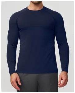 Detailed view of navy blue seamless long-sleeved athletic compression shirt for men