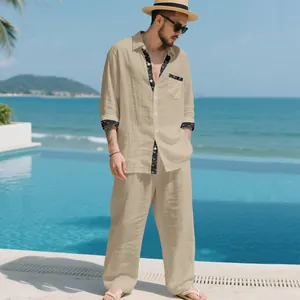 Detail of a beige linen men's leisure set in old money style with patterned trim.