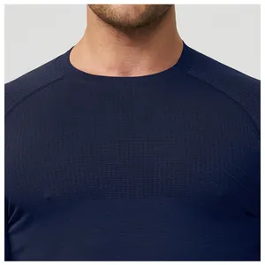 Close-up of the neckline and breathable textured fabric of the navy sports shirt