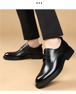 Detailed view of men's black leather Derby shoes featuring a classic lace-up design