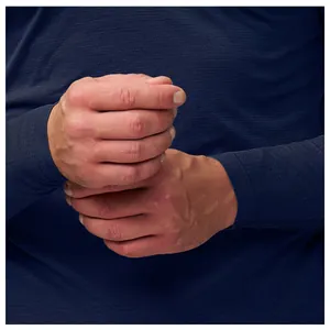 Detailed macro view of seamless quick-dry navy athletic T-shirt fabric and sleeve cuff