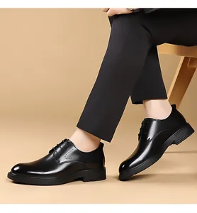 Detail view of men's high-quality black leather Derby shoes with classic lace-up design