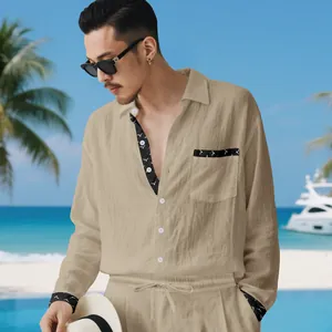 Close-up of men's beige linen shirt and pants set with stylish black printed trims
