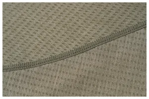 Close-up macro view of breathable mesh fabric and durable stitching on sports T-shirt