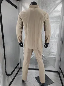 Back view of men's beige linen casual two-piece set featuring long sleeve shirt and trousers
