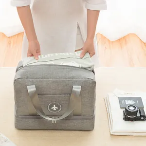 Large grey travel storage bag with dry wet separation compartment for gym and beach use