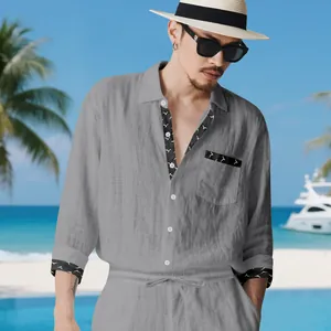 Detailed view of men's casual grey linen two-piece set featuring stylish patterned trim
