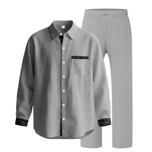Detail view of men's casual linen long-sleeve shirt and pants set in light grey color