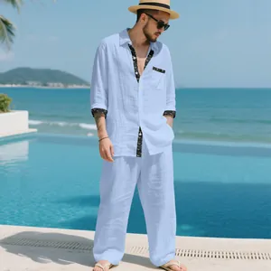 Men's light blue casual linen two-piece set with patterned trim for vacation wear