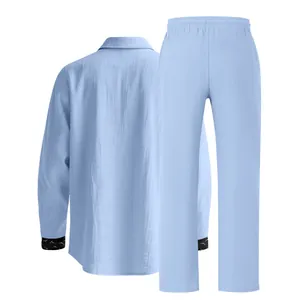 Men's light blue linen casual two-piece set featuring long sleeve shirt and trousers.