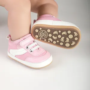 Detailed view of pink infant canvas pre-walker shoes featuring durable anti-slip rubber soles