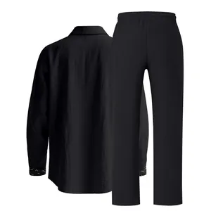 Back view of a black linen blend two-piece set featuring long sleeves and trousers.
