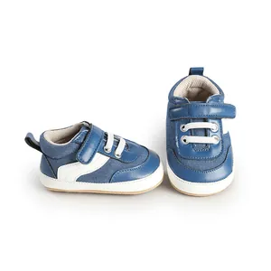 Close-up of blue baby canvas walking shoes with convenient hook and loop closure