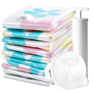 Space saving floral pattern vacuum storage bags set with a white manual hand pump