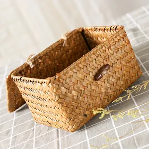 Handmade straw woven storage box with lid and wooden toggle button for home organization