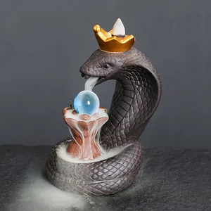 Creative purple sand king cobra backflow incense burner with crown and blue crystal ball