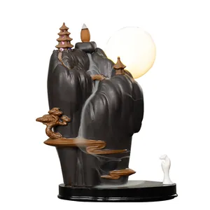Ceramic backflow incense burner with mountain waterfall design and LED moon lamp décor