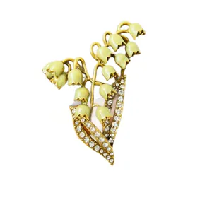 Vintage enamel lily of the valley brooch with rhinestones for elegant suit accessories