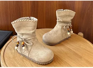 Eleganti stivali a metà polpaccio vintage in pelle scamosciata per bambina con fiocco