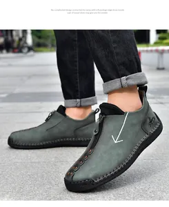 Close-up of men's handmade stitched leather casual boots with side zipper