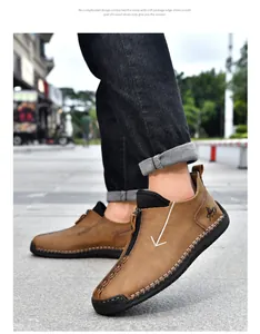 Close-up detail of hand-stitched men's casual leather shoes with zipper and horse logo