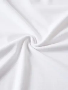 Dettaglio macro del tessuto jersey di cotone bianco traspirante per t-shirt a maniche lunghe