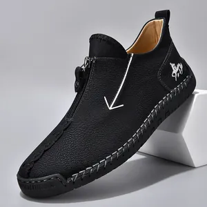 Men's black leather casual boots with zipper closure and handmade white stitching