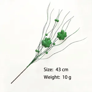 Close-up detail of 43cm glittery green four-leaf clover spray for St. Patrick's Day decor