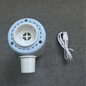 Portable electric vacuum pump for storage bags including white USB charging cable.