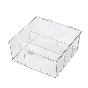 Clear acrylic storage box with 8 internal dividers and dustproof lid for desk organization