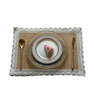 Rustic burlap placemat with white lace trim for elegant wedding dining table decor