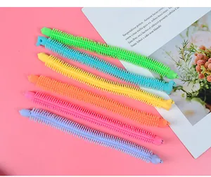 Set of six colorful alpaca stretchy string fidget toys with soft tactile sensory textures