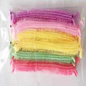 Detail view showing a pack of six colorful alpaca-shaped stretchy sensory pull toys