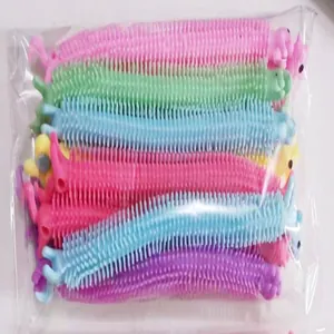 Close-up of 12-pack colorful llama-shaped stretchy sensory fidget toys in plastic wrap