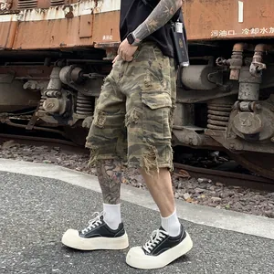 Men's American vintage distressed camouflage cargo shorts with heavy ripped details