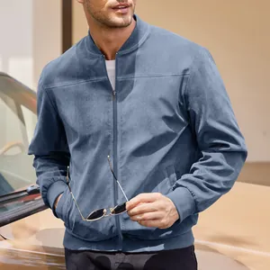 Detail shot of a blue suede bomber jacket with a stand collar and ribbed cuffs.