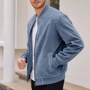 Close-up of a men's blue suede bomber jacket with a stand collar and zipper detail.
