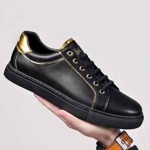 Premium μαύρα δερμάτινα sneakers με χρυσές λεπτομέρειες και χοντρή σόλα καουτσούκ