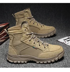 Close-up of sand-colored men's outdoor tactical work boots with durable rubber lug soles